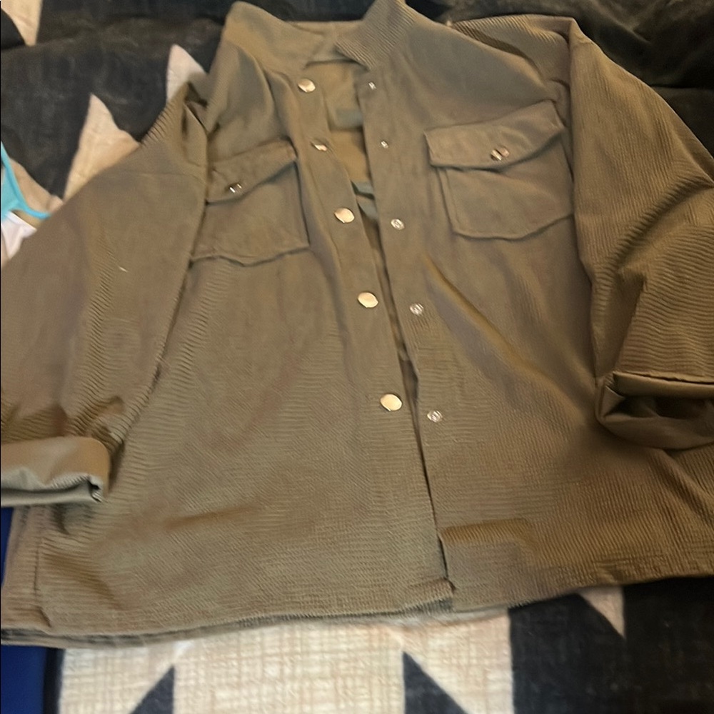 Woman’s green jacket